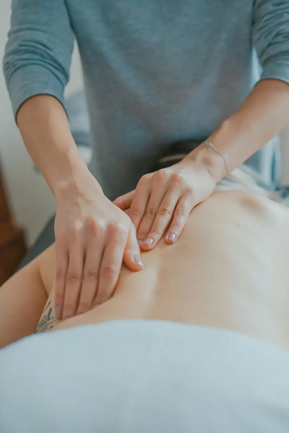 A massage therapist at work